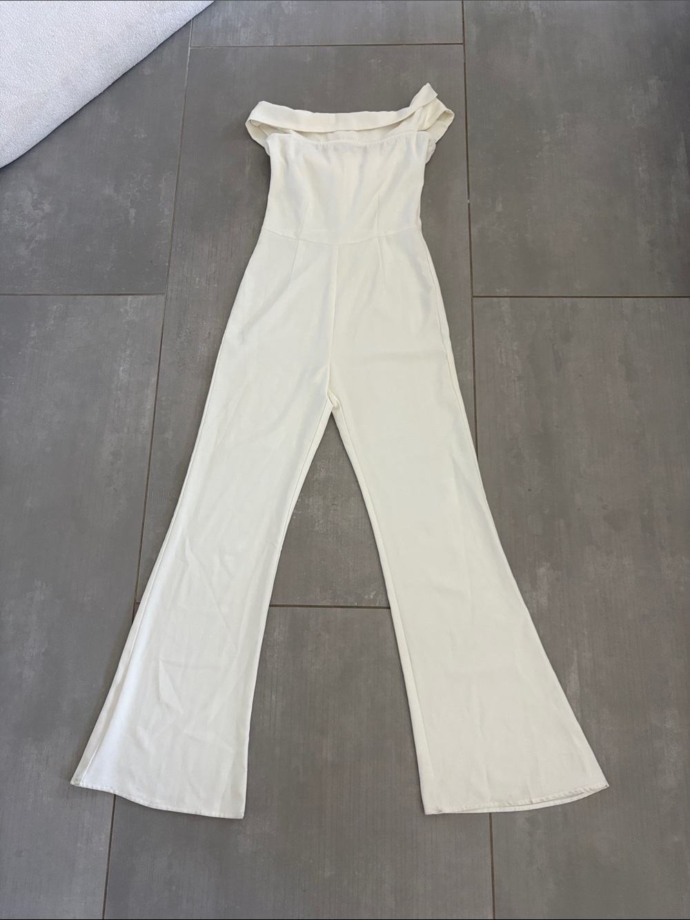 by the way. Off-Shoulder Cream Boot Flare Jumpsuit